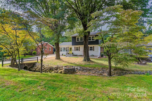 view of front of home with a front yard