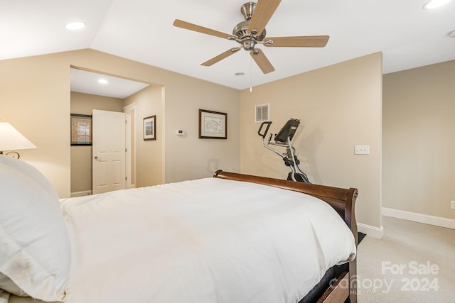 bedroom with ceiling fan, light colored carpet, and lofted ceiling