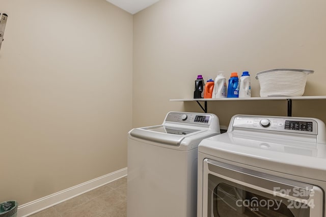 laundry area with separate washer and dryer