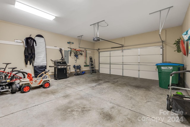 garage featuring a garage door opener