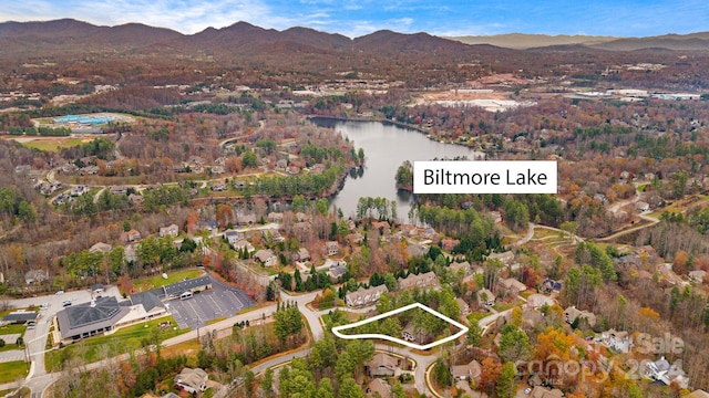 bird's eye view featuring a water and mountain view