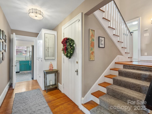 foyer entrance featuring light wood-type flooring