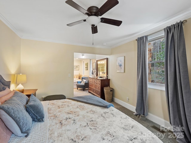 bedroom with ceiling fan, ornamental molding, and dark carpet