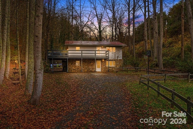 exterior space featuring a wooden deck