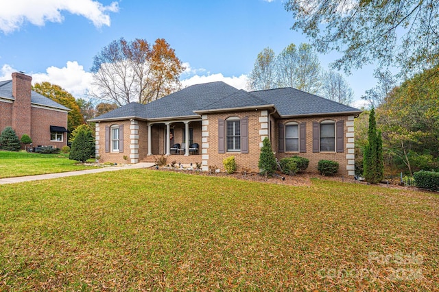 single story home with a front yard