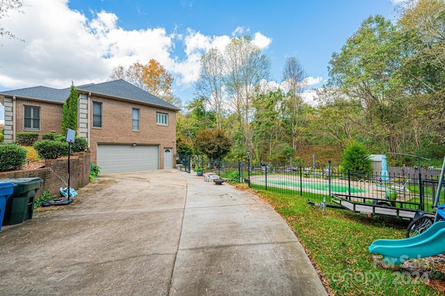 view of side of property with a garage