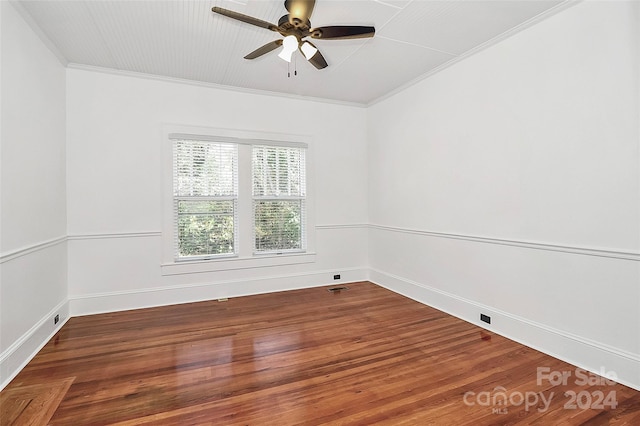 empty room featuring crown molding, ceiling fan, and hardwood / wood-style flooring