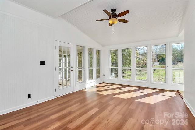 unfurnished sunroom with vaulted ceiling and ceiling fan