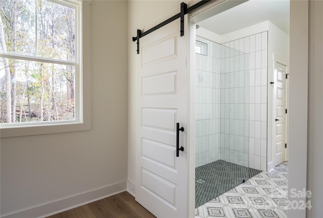 bathroom with hardwood / wood-style flooring