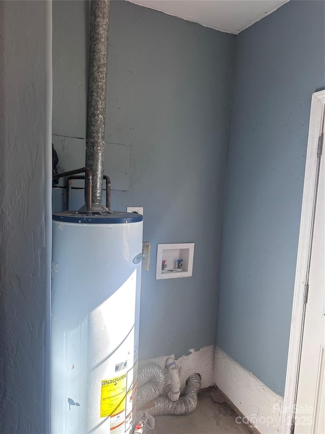 utility room featuring gas water heater