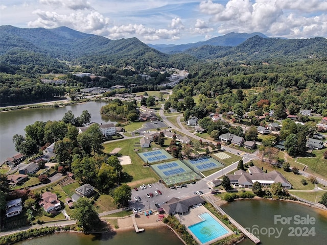 bird's eye view featuring a water and mountain view