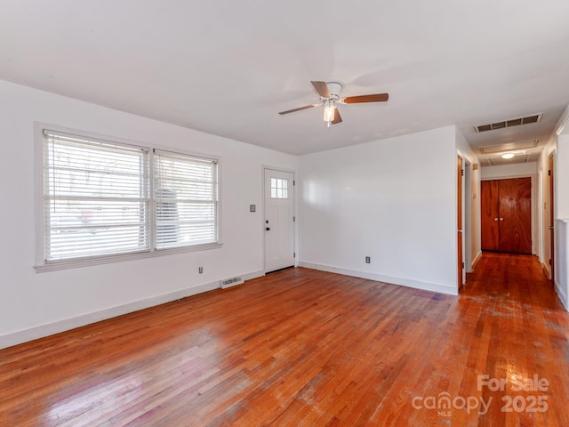 interior space featuring hardwood / wood-style flooring and ceiling fan