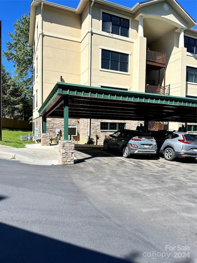 155 Gateway Dr Unit 101, Boone, NC 28607 - view of building exterior featuring covered parking