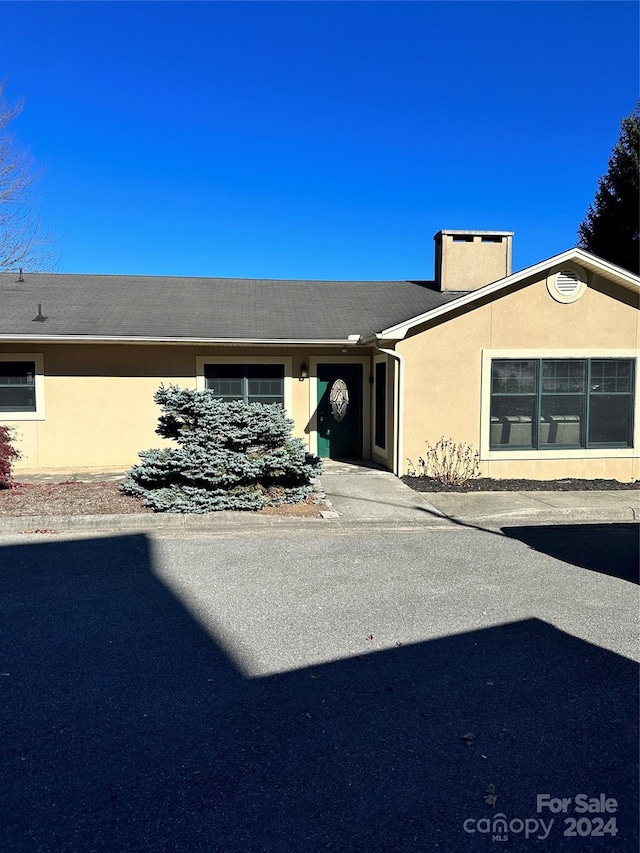 155 Gateway Dr Unit 101, Boone, NC 28607 - doorway to property featuring stucco siding