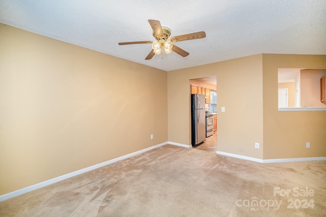 105 Ranlo Ave, Gastonia, NC 28054 - spare room with ceiling fan, light colored carpet, and baseboards
