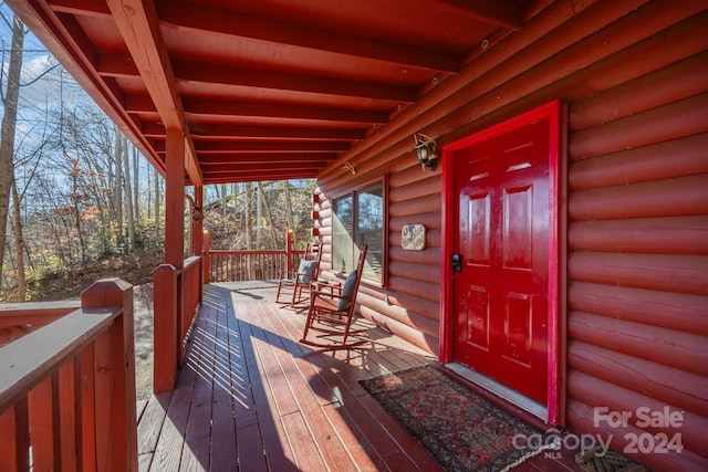 deck with covered porch