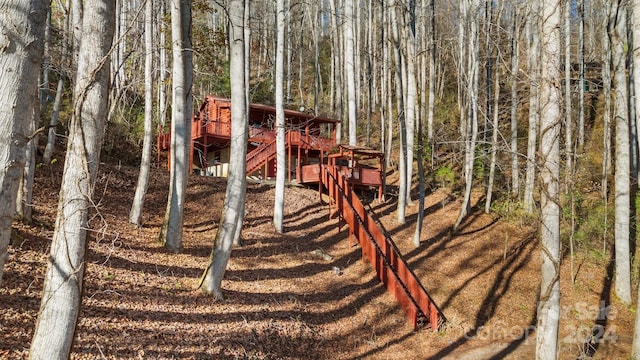 view of yard featuring a wooden deck