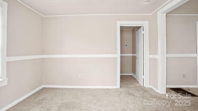 408 E Washington Ave, Bessemer City, NC 28016 - interior space featuring light colored carpet, crown molding, and baseboards