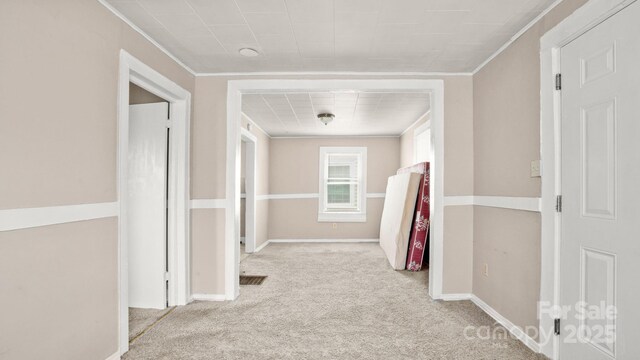 408 E Washington Ave, Bessemer City, NC 28016 - corridor featuring ornamental molding, light colored carpet, and baseboards