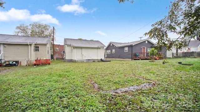 408 E Washington Ave, Bessemer City, NC 28016 - view of yard featuring an outbuilding, fence, a deck, and a storage unit