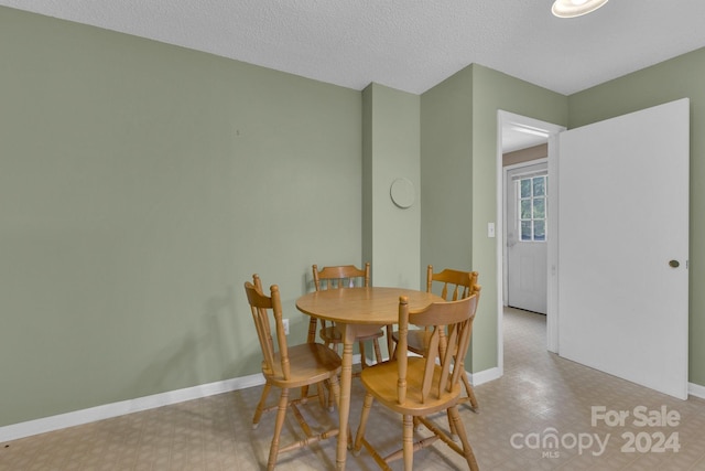 2664 Charles Teague Pl, Lenoir, NC 28645 - dining area featuring tile patterned floors and baseboards