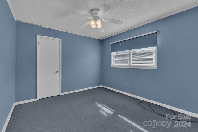2664 Charles Teague Pl, Lenoir, NC 28645 - carpeted empty room featuring a textured ceiling and ceiling fan