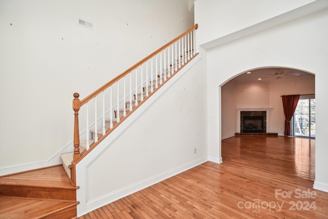 stairs featuring wood-type flooring