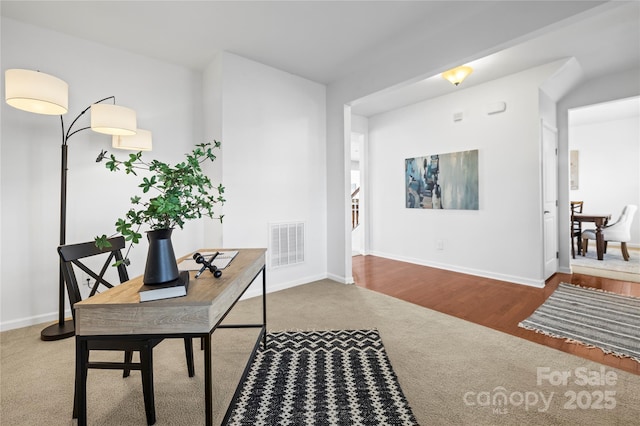 view of carpeted home office