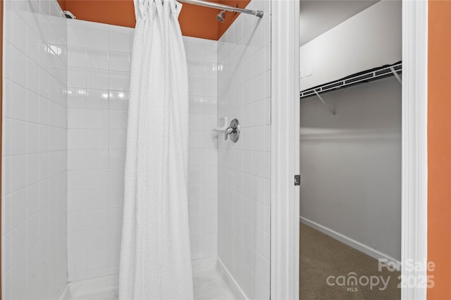 bathroom featuring curtained shower