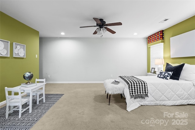 carpeted bedroom featuring ceiling fan