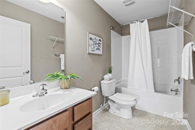 full bathroom featuring vanity, shower / tub combo with curtain, and toilet