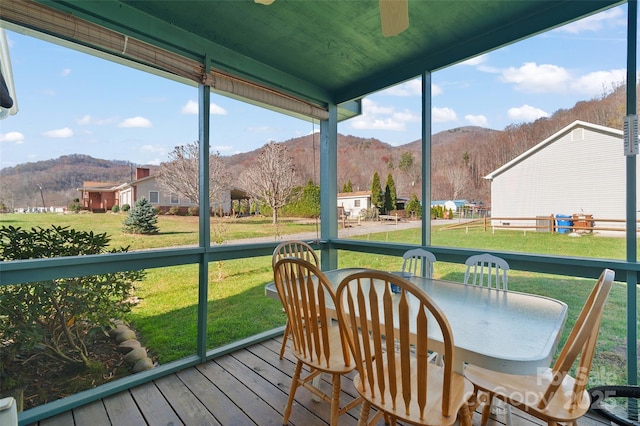17 Dream Meadow Ln, Maggie Valley, NC 28751 - sunroom / solarium featuring outdoor dining area, a mountain view, and a ceiling fan