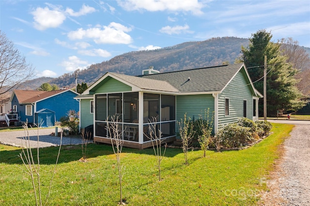 17 Dream Meadow Ln, Maggie Valley, NC 28751 - back of property with a yard, a sunroom, a shingled roof, and a mountain view