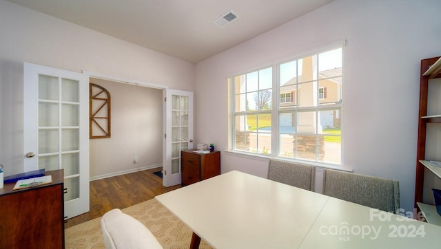 office area featuring french doors and hardwood / wood-style flooring