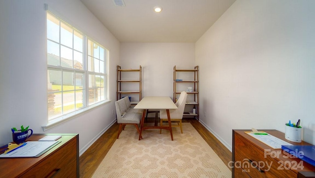 sitting room with light hardwood / wood-style floors