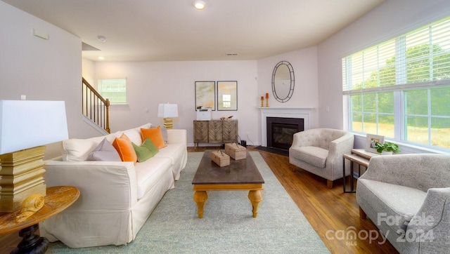 living room with light hardwood / wood-style floors