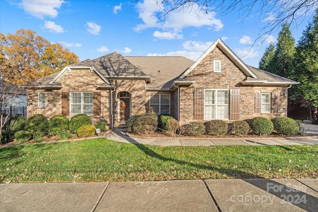 front of property with a front yard