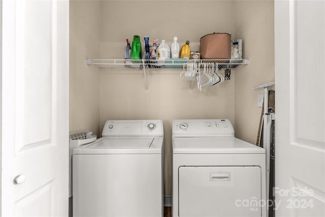 laundry area featuring washer and clothes dryer