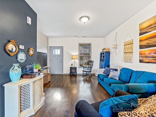 living room featuring dark wood-type flooring