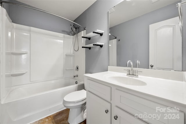 full bathroom with vanity, toilet, and tub / shower combination