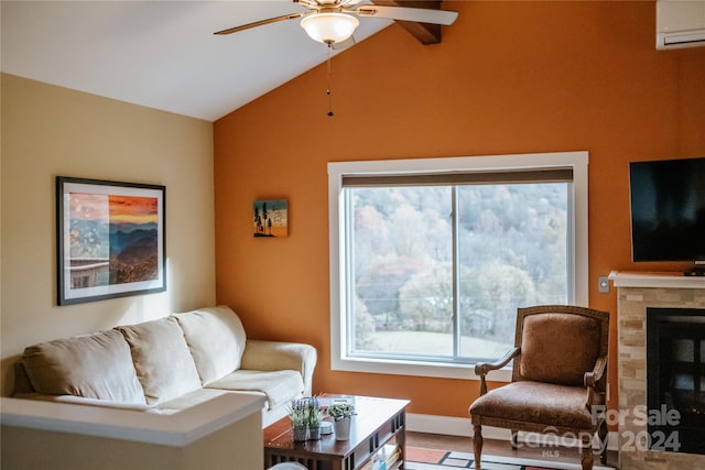 living room with lofted ceiling, ceiling fan, a fireplace, a wall mounted AC, and wood-type flooring