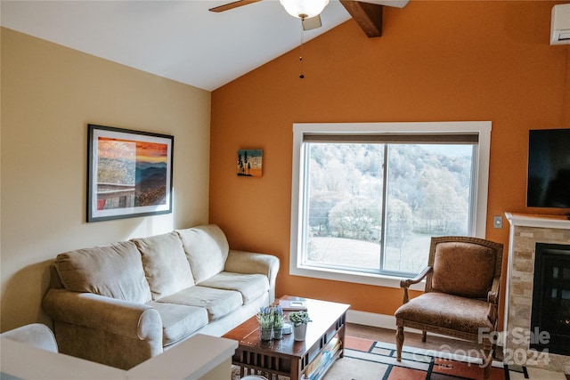 living room with a fireplace, lofted ceiling with beams, a wealth of natural light, and ceiling fan