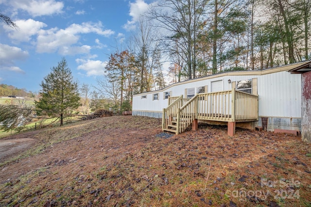 view of yard featuring a deck