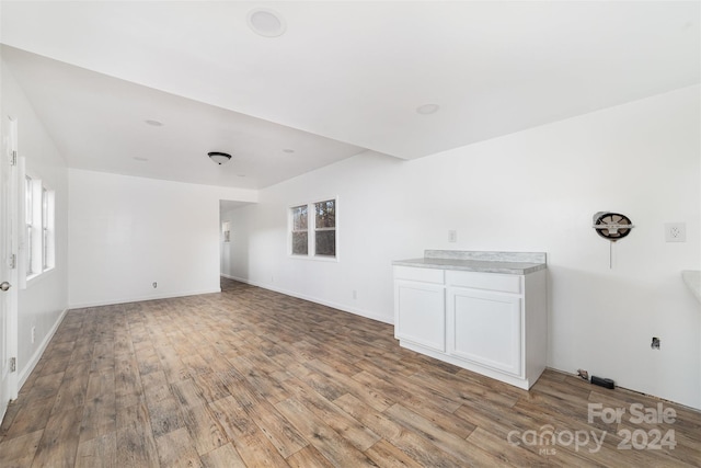 unfurnished room featuring light hardwood / wood-style flooring