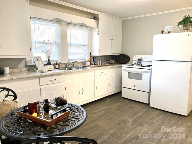 kitchen featuring ornamental molding, white appliances, dark wood-type flooring, sink, and white cabinets