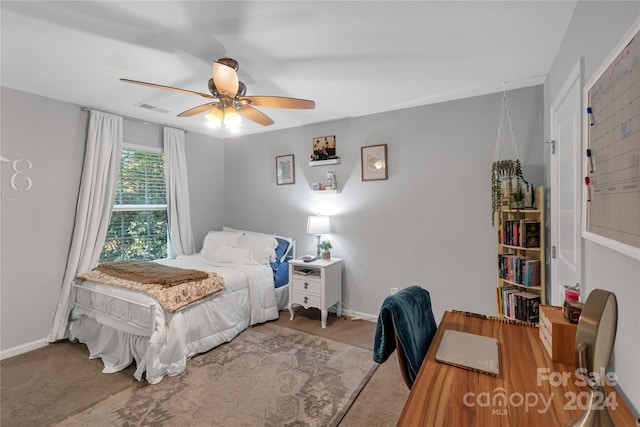 bedroom featuring ceiling fan and carpet floors