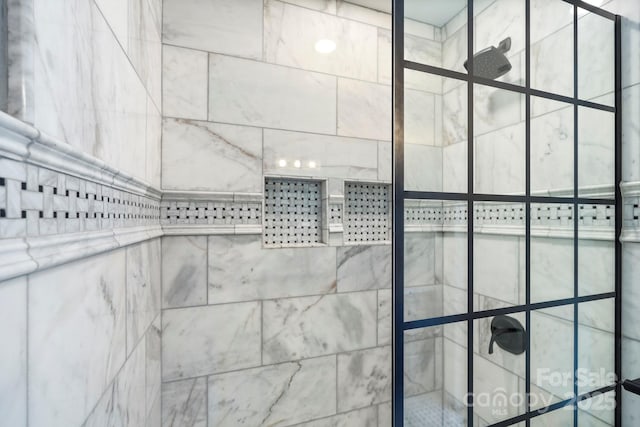 details with a tile shower