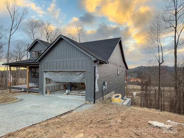 view of property exterior at dusk