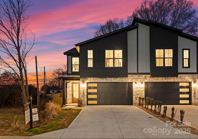 modern home featuring a garage