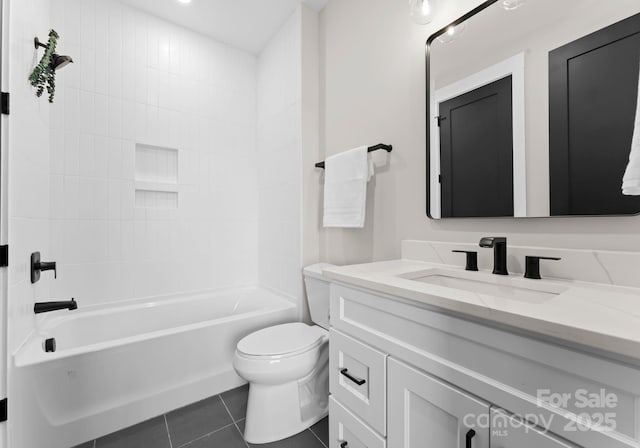 full bathroom with tile patterned flooring, vanity, bathing tub / shower combination, and toilet